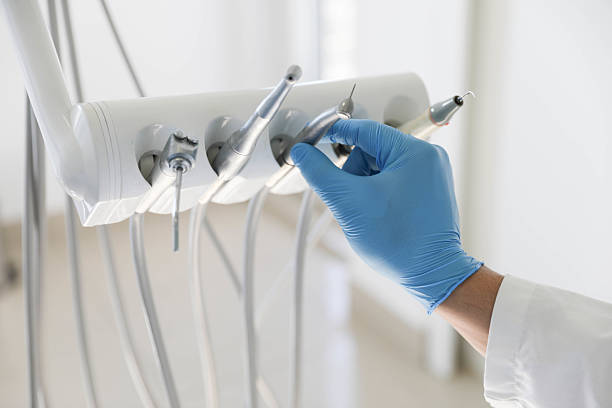 Professional Tooth Extraction technician working in Brownsville, LA